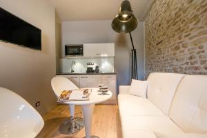 Appartements Maison du colombier : photos des chambres