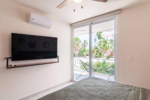 Ground level Garden condo at Akumal south by TAO Santamar