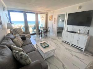 Island Winds East 202 by ALBVR - Beautifully renovated beachfront condo & steps away from Hangout & more!