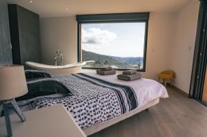 Villas Superbe Villa avec Piscine et jacuzzi chauffees, vue sur les collines : photos des chambres