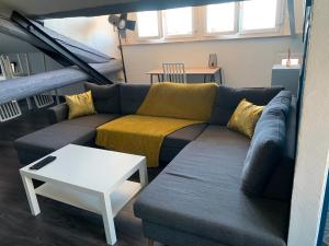 Appartements Appart climatise style loft avec garage : photos des chambres