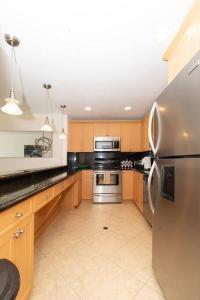 Modern Oceanview Condo - Steps to the Beach!