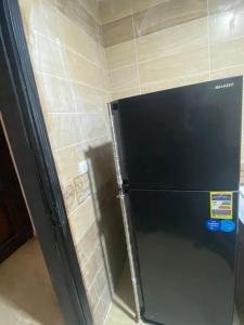 Cozy Room with AC near madinty in Shorouk City in an apartment