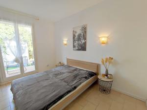 Appartements Appartement avec jardin privatif a 300m de la plage *2* : photos des chambres