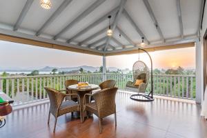 SaffronStays Mango Lakeview Villa - 3BR pool villa amid mango farms with Gangapur Dam views, deck & games