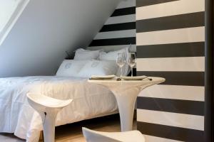 Appartements Maison du colombier : photos des chambres