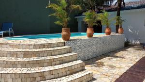 Casa c piscna em cond. fechado