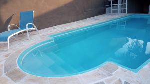 Casa c piscna em cond. fechado