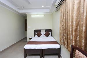 Hotel O Saraswathi Residency Near SR Nagar Metro Station