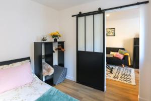 Appartements Le Black Pearl avec salle de sport : photos des chambres
