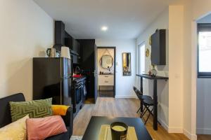 Appartements Le Black Pearl avec salle de sport : photos des chambres