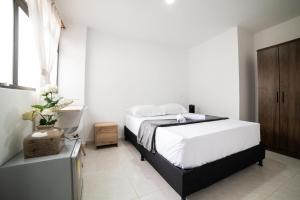 Descansa y Explora Habitación Privada en Medellín C