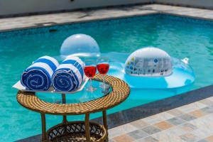SaffronStays Mango Lakeview Villa - 3BR pool villa amid mango farms with Gangapur Dam views, deck & games