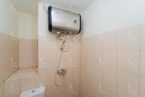 RedLiving Apartemen Tamansari Panoramic - Rasya Room