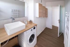 Appartements Oasis urbaine - proche centre-ville - garage : photos des chambres