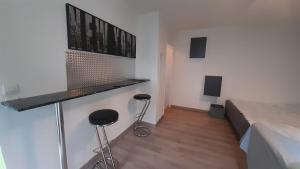 Appartements Au pied de la Gare de Cergy le haut, centre villes : photos des chambres