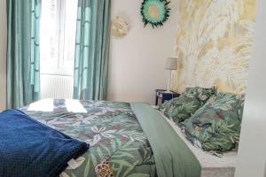 Appartements Cosy Queen -3ch- Centre ville & Parking privee - WIFI haut debit : photos des chambres