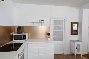 Appartements Cosy Queen -3ch- Centre ville & Parking privee - WIFI haut debit : photos des chambres