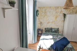 Appartements Cosy Queen -3ch- Centre ville & Parking privee - WIFI haut debit : photos des chambres