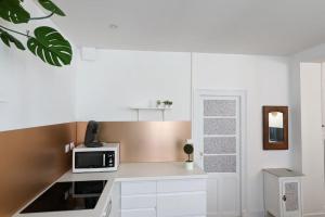 Appartements Cosy Queen -3ch- Centre ville & Parking privee - WIFI haut debit : photos des chambres