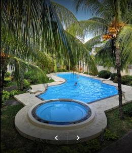 Opp Swimming Poll, Ground Floor, Flic En Flac - 4hvězdičkové hotely ve městě Flic-en-Flac