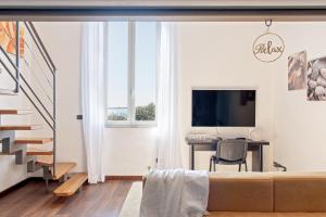 Sea Breeze Loft by Pleiades Home