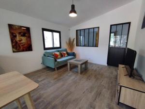 Appartements Appartement avec jardin privatif : photos des chambres