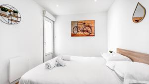 Appartements HOMEY SUBWAY - Hypercentre - Proche Gare et Tram - Wifi gratuit : photos des chambres