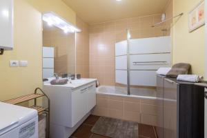 Appartements Studio Cosy les Perruches : photos des chambres