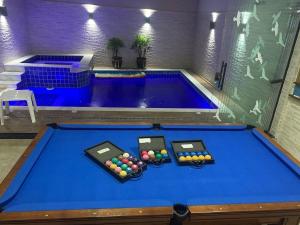 Piscina com ofurôChurrasqueiraSinuca e Ping Pong