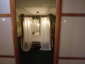 Appartements Le Jardin d'Eden -Appartement de charme avec Sauna, Hammam, spa : photos des chambres