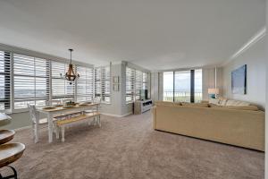 Cozy Coastal Condo with Pool Access Steps to Beach!