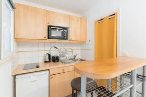 Appartements Nice and Comfortable Studio Apartment - Paris : photos des chambres