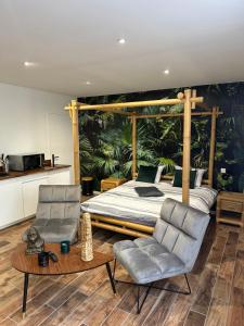 Maisons de vacances Jungle room : photos des chambres