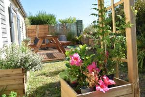 Maisons de vacances Blaz an Holen - Maison avec jardin a Guimaec : photos des chambres