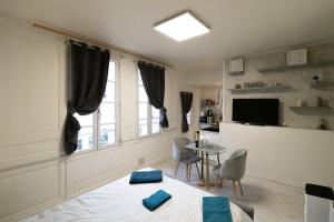 Appartements Le Papillon de la Cathedrale - Calme - Jardin - Wifi : photos des chambres