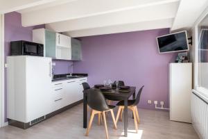 Appartements Studio NATHEN - Parking - Wifi - Balcon Sud ouest - Chamrousse 1650 : photos des chambres