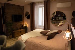 Appartements Studio coeur de ville sanary tres cosy parking : photos des chambres