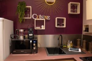 Appartements Studio coeur de ville sanary tres cosy parking : photos des chambres