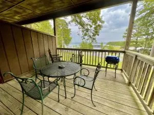 Lake view queen guest room with two queens, sleeper sofa and patio overlooking Lake Ouachita, Hotel Room - Boles