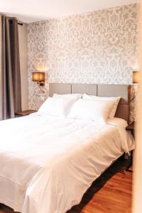 Hotels Le Coq Hardi : photos des chambres