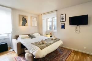Appartements L'esthete *100m de la mer* : photos des chambres