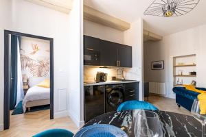 Appartements Le Wilson Parc : T2 avec parking : photos des chambres