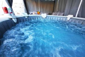 Villas Villa confortable avec Jacuzzi a Chevannes : photos des chambres