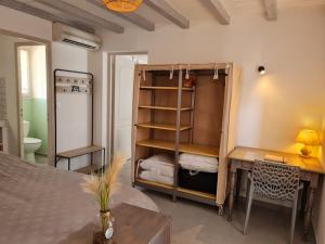 Appartements appart cosy avec son exterieur chaleureux,piscine et parking prive : photos des chambres