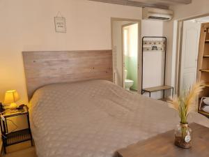 Appartements appart cosy avec son exterieur chaleureux,piscine et parking prive : photos des chambres