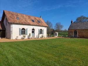 Maisons de vacances La Ferme Neuve : photos des chambres