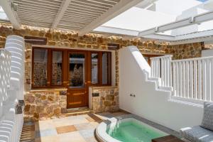 Junior Suite with Balcony & Outdoor Hot Tub room in marvarit suites