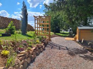 Chalets Le Chalet Aura et Jacuzzi : photos des chambres