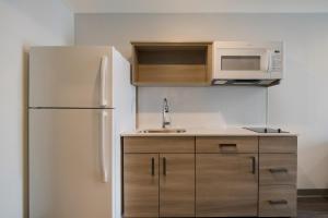 QUEEN SUITE room in WoodSpring Suites Grand Rapids Kentwood